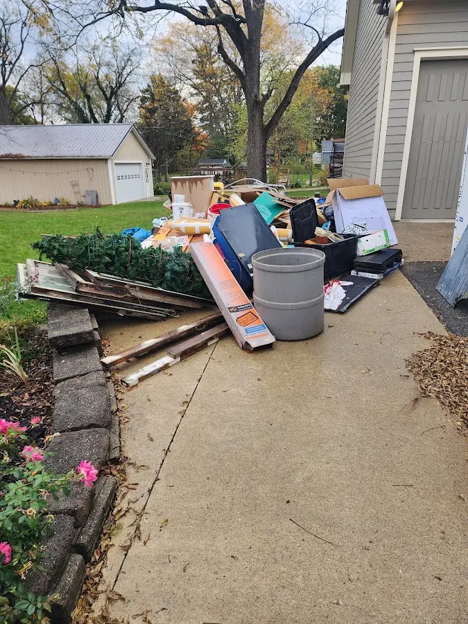 Dumpster being loaded with debris for 3 Yard Dumpster Rental in East Fishkill